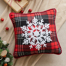 Load image into Gallery viewer, Tartan Christmas Cushion Covers by Allthingscurated spots classic tartan print with embroidered snowflake, jingle bell and holiday greetings. Timeless and stylish, these covers are easy to mix and match with other solid-colored or festive pillows. They are perfect for creating a festive ensemble for your sofa or favorite couch to experience the magic of the holiday season. Featured here is snowflake design Red and Black tartan.