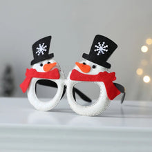 Load image into Gallery viewer, These Christmas Party Glasses by Allthingscurated are the perfect fun accessory for festive parties and gatherings during the holiday season. Their unique design and cheerful holiday style make them great props for creating memorable moments an happy Instagram posts to capture the joy of the season. Featured here is Snowman design.