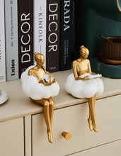 Load image into Gallery viewer, Sophie Cloud Girl Sculptures by Allthingscurated feature 2 beautiful lady statues in 2 postures—reading and pondering. Adorned with a classic ballerina bun and dressed in a minimalistic dress that ends with a voluminous skirt reminiscent of fluffy clouds. These sculptures bring a touch of serenity and sophistication to your living space.