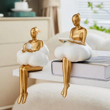 Load image into Gallery viewer, Sophie Cloud Girl Sculptures by Allthingscurated feature 2 beautiful lady statues in 2 postures—reading and pondering. Adorned with a classic ballerina bun and dressed in a minimalistic dress that ends with a voluminous skirt reminiscent of fluffy clouds. These sculptures bring a touch of serenity and sophistication to your living space.