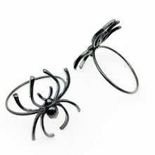 Load image into Gallery viewer, Spider Napkin Rings set of 6 by Allthingscurated spots a stylish and modern design that is perfect for decorating your table for Halloween or any gothic-themed event. Comes in 4 captivating colors of black, gunmetal, champagne gold and silver, these accessories will dress up your napkins and add a touch of edgy elegance to your dining experience.