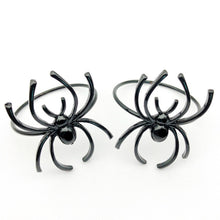Load image into Gallery viewer, Spider Napkin Rings set of 6 by Allthingscurated spots a stylish and modern design that is perfect for decorating your table for Halloween or any gothic-themed event. Comes in 4 captivating colors of black, gunmetal, champagne gold and silver, these accessories will dress up your napkins and add a touch of edgy elegance to your dining experience.
