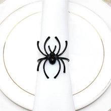 Load image into Gallery viewer, Spider Napkin Rings set of 6 by Allthingscurated spots a stylish and modern design that is perfect for decorating your table for Halloween or any gothic-themed event. Comes in 4 captivating colors of black, gunmetal, champagne gold and silver, these accessories will dress up your napkins and add a touch of edgy elegance to your dining experience.