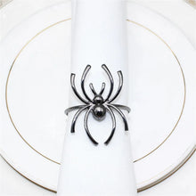 Load image into Gallery viewer, Spider Napkin Rings set of 6 by Allthingscurated spots a stylish and modern design that is perfect for decorating your table for Halloween or any gothic-themed event. Comes in 4 captivating colors of black, gunmetal, champagne gold and silver, these accessories will dress up your napkins and add a touch of edgy elegance to your dining experience.