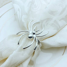 Load image into Gallery viewer, Spider Napkin Rings set of 6 by Allthingscurated spots a stylish and modern design that is perfect for decorating your table for Halloween or any gothic-themed event. Comes in 4 captivating colors of black, gunmetal, champagne gold and silver, these accessories will dress up your napkins and add a touch of edgy elegance to your dining experience.
