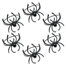 Load image into Gallery viewer, Spider Napkin Rings set of 6 by Allthingscurated spots a stylish and modern design that is perfect for decorating your table for Halloween or any gothic-themed event. Comes in 4 captivating colors of black, gunmetal, champagne gold and silver, these accessories will dress up your napkins and add a touch of edgy elegance to your dining experience. Featured here is the Black set.
