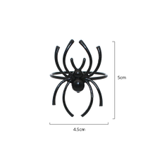 Load image into Gallery viewer, Spider Napkin Rings set of 6 by Allthingscurated spots a stylish and modern design that is perfect for decorating your table for Halloween or any gothic-themed event. Comes in 4 captivating colors of black, gunmetal, champagne gold and silver, these accessories will dress up your napkins and add a touch of edgy elegance to your dining experience.