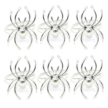 Load image into Gallery viewer, Spider Napkin Rings set of 6 by Allthingscurated spots a stylish and modern design that is perfect for decorating your table for Halloween or any gothic-themed event. Comes in 4 captivating colors of black, gunmetal, champagne gold and silver, these accessories will dress up your napkins and add a touch of edgy elegance to your dining experience. Featured here is the Silver set.