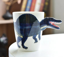 Load image into Gallery viewer, 3D Dinosaur Mug Collection by Allthingscurated consists of 8 unique dinosaur designs with each mug holding a generous capacity of 400ml or 13.5 ounce. Made of high-quality porcelain, they are the perfect gift for dinosaur lovers. The design seen ehre is Spinosaurus.