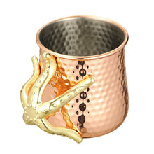 Load image into Gallery viewer, This one-of-a-kind Starfish Copper-plated Mug by Allthingscurated is more than just interesting. Featuring a playful design and a striking starfish handle for a secure grip, it makes a charming conversation piece at your next gathering. Crafted from stainless steel and copper-plated for the exterior, it will keep your cold beverage icy and refreshing. Has a capacity of 540ml or 18 ounce. A great gift idea for anyone who likes a little whimsy and playfulness while enjoying their favorite drink.