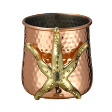 Load image into Gallery viewer, This one-of-a-kind Starfish Copper-plated Mug by Allthingscurated is more than just interesting. Featuring a playful design and a striking starfish handle for a secure grip, it makes a charming conversation piece at your next gathering. Crafted from stainless steel and copper-plated for the exterior, it will keep your cold beverage icy and refreshing. Has a capacity of 540ml or 18 ounce. A great gift idea for anyone who likes a little whimsy and playfulness while enjoying their favorite drink.