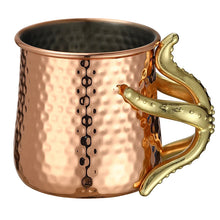 Load image into Gallery viewer, This one-of-a-kind Starfish Copper-plated Mug by Allthingscurated is more than just interesting. Featuring a playful design and a striking starfish handle for a secure grip, it makes a charming conversation piece at your next gathering. Crafted from stainless steel and copper-plated for the exterior, it will keep your cold beverage icy and refreshing. Has a capacity of 540ml or 18 ounce. A great gift idea for anyone who likes a little whimsy and playfulness while enjoying their favorite drink.