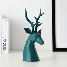 Load image into Gallery viewer, This beautiful Deer Head Bust sculpture is made of resin and comes available in 4 colors of black, white, gray and teal. Measuring 26cm or 10 inches in height and 11.5cm or 4.5 inches in width. This figurine spots a contemporary design with sculptural form inspired by Origami. This decorative piece will add timeless elegance to your space year-round. Perfect for festive tablescapes, mantels and shelves. This is a deer head bust in Teal.