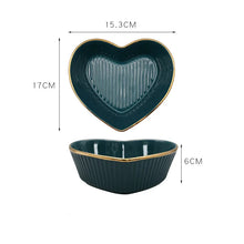 Load image into Gallery viewer, Teal Heart-shaped ceramic bowls with dimensions on a white background. Gold-rimmed Heart Shape Ceramic Bowl by Allthingscurated is a beautiful and versatile piece to own in your dinnerware collection. Perfect for salads, desserts and appetizers, its charming design adds an extra touch of romance for Valentine’s Day dinner; and make everyday meals extra special.