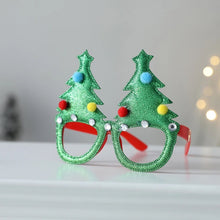 Load image into Gallery viewer, These Christmas Party Glasses by Allthingscurated are the perfect fun accessory for festive parties and gatherings during the holiday season. Their unique design and cheerful holiday style make them great props for creating memorable moments an happy Instagram posts to capture the joy of the season. Featured here is Green Treen Design.