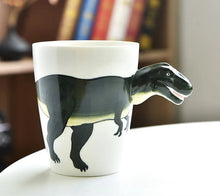 Load image into Gallery viewer, 3D Dinosaur Mug Collection by Allthingscurated consists of 8 unique dinosaur designs with each mug holding a generous capacity of 400ml or 13.5 ounce. Made of high-quality porcelain, they are the perfect gift for dinosaur lovers. The design seen here is Tyrannosaurus Rex.