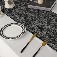 Load image into Gallery viewer, Black Lace Spider Web Table Runner by Allthingscurated. This stunning Black Spider Web Table Runner designed in elegant black lace featuring spiders and cobweb embroidery will make a bold statement for your Halloween table setting.