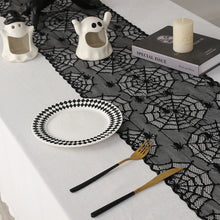 Load image into Gallery viewer, Black Lace Spider Web Table Runner by Allthingscurated. This stunning Black Spider Web Table Runner designed in elegant black lace featuring spiders and cobweb embroidery will make a bold statement for your Halloween table setting.