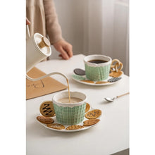 Load image into Gallery viewer, The Waffle Cup and Plate collection by Allthingscurated features a charming waffle pattern and whimsical biscuit design that will bring a smile to your breakfast. Each piece is hand painted on porcelain. Perfect for breakfast and tea time. Makes a great gift for any occasion. Cup and plate each comes in 4 designs to choose from.