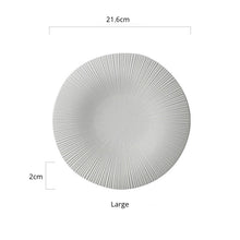 Load image into Gallery viewer, Line Textured Dinner Plates by Allthingscurated featured distinct bold lines that exude modernity and timelessness. Come in stylish black and white, they mix and match easily with your existing dinnerware and suitable for a wide range of occasions. Come in 2 sizes. Featured here is the large plate in White.