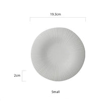 Load image into Gallery viewer, Line Textured Dinner Plates by Allthingscurated featured distinct bold lines that exude modernity and timelessness. Come in stylish black and white, they mix and match easily with your existing dinnerware and suitable for a wide range of occasions. Come in 2 sizes. Featured here is the small plate in White.