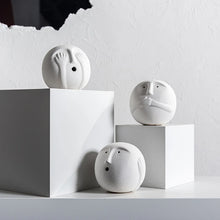 Load image into Gallery viewer, Wise Men Expression Sculptures by Allthingscurated spots a minimalist design made from high-quality ceramic. Available in 3 expression designs of See No Evil, Hear No Evil and Speak No Evil. These sculptures bring a modern touch and promote a positive and peaceful environment to your living space. They are stylish pieces for any contemporary homes. Featured here is a set of 3 sculptures.