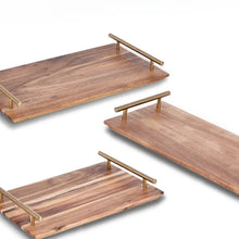 Load image into Gallery viewer, Wooden Serving Tray by Allthingscurated is designed with versatility and organic beauty in mind. Crafted from natural wood and accented with gold hardware handles for easy transportation and handling, these wooden trays serve up your sliced breads, cheeses and drinks in style. With 3 size options, they are ideal for hosting and a nice presentation with a natural touch to your table.