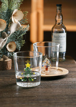 Load image into Gallery viewer, Christmas Tree Drinking Glass by Allthingscurated has a playful and whimsical design, featuring a sculptural 3D Christmas Tree within the tumbler. The tree comes in a 2 colors, green and white. Measuring 8.5cm or 3.3 inches in width at the top, 9cm or 3.5 inches in height and 6.5cm or 2.5 inches in width at the base, the drinking glass has a capacity of 300ml or 10 ounce.