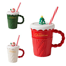 Load image into Gallery viewer, Snow Capped Christmas Gift Mug by Allthingscurated boasts festive colors of red, green and white, featuring a Merry Christmas greeting engraved on the mug. The elegant mug is crafted from ceramic with a snow-like lid and a charming Christmas relief pattern, making it the perfect gift for your friends and colleagues during office parties. Comes with a straw for added convenience.
