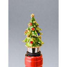 Load image into Gallery viewer, Enamel Christmas Tree Bottle Stopper by Allthingscurated is crafted of food-safe zinc alloy and hand-molded enamel. Its classic and iconic Christmas tree is designed with vivid details and adds a charming festive touch to any bar or table. Makes for a great hostess gift too.