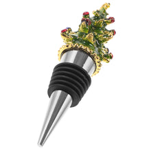 Load image into Gallery viewer, Enamel Christmas Tree Bottle Stopper by Allthingscurated is crafted of food-safe zinc alloy and hand-molded enamel. Its classic and iconic Christmas tree is designed with vivid details and adds a charming festive touch to any bar or table. Makes for a great hostess gift too.