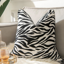 Load image into Gallery viewer, Glamorous Animal Prints Cushion Covers by Allthingscurated featured 6 animal print designs in tiger stripes, cheetah spots, zebra stripes and giraffe print. In a neutral palette and warm texture that work well with a variety of decorating styles. Timeless and chic, they are the perfect accessories to dress up with home with a wow factor. Comes in 2 square sizes of 45 by 45cm or 17.5 by 17.5 inches or 50 by 50cm or 19.5 by 19.5 inches. Featured here is the black white zebra print.