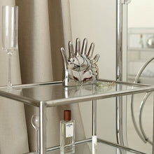 Load image into Gallery viewer, This abstract, one-of-a-kind contemporary jewelry holder by Allthingscurated is designed as an upright-standing palm with 6 fingers for slotting your favorite rings, bracelets or bangles. Made of ceramic and available in silver and black. It measures 19cm or 7.4 inches in width, 16cm or 6.2 inches in height and 14.5cm or 5.7 inches in depth.