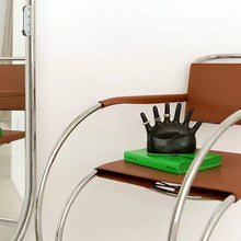 Load image into Gallery viewer, This abstract, one-of-a-kind contemporary jewelry holder by Allthingscurated is designed as an upright-standing palm with 6 fingers for slotting your favorite rings, bracelets or bangles. Made of ceramic and available in silver and black. It measures 19cm or 7.4 inches in width, 16cm or 6.2 inches in height and 14.5cm or 5.7 inches in depth.