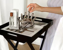 Load image into Gallery viewer, This abstract, one-of-a-kind contemporary jewelry holder by Allthingscurated is designed as an upright-standing palm with 6 fingers for slotting your favorite rings, bracelets or bangles. Made of ceramic and available in silver and black. It measures 19cm or 7.4 inches in width, 16cm or 6.2 inches in height and 14.5cm or 5.7 inches in depth.