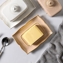 Load image into Gallery viewer, Retro-style Porcelain Butter Dish by Allthingscurated comes in 2 muted tones of Antique White and Antique Peach. A butter dish that comes with a cover with beautiful patterns, it is an ideal and practical storage for your butter. Measures 19.3cm or 7.5 inches in width, 9cm or 3.5 inches in height and 14.2cm or 5.5 inches in depth.