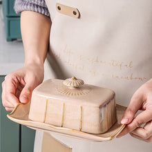 Load image into Gallery viewer, Retro-style Porcelain Butter Dish by Allthingscurated comes in 2 muted tones of Antique White and Antique Peach. A butter dish that comes with a cover with beautiful patterns, it is an ideal and practical storage for your butter. Measures 19.3cm or 7.5 inches in width, 9cm or 3.5 inches in height and 14.2cm or 5.5 inches in depth.