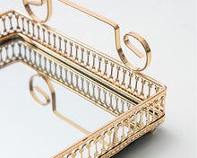 Load image into Gallery viewer, Donatella mirror tray by Allthingscurated showing off its gold-gilded handle and intricate patterns framing the tray with gleaming mirror surface.
