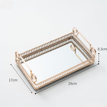 Load image into Gallery viewer, Donatella Mirror tray by Allthingscurated features a mirror surface and intricate gold-gilded pattern surround all sides of the rectangle tray and with 2 handles. Available in small, medium and large size. Featured here is a medium size tray measuring length 29cm by width 17cm and height 8.3cm or length 11.3 inches by width 6.6 inches and height 3 inches.