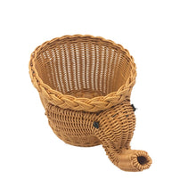 Load image into Gallery viewer, Allthingscurated elephant shape rattan basket in dark caramel color. Measuring height 16cm, diameter 20cm and width 30cm. Ideal as a storage basket or as a pot holder for your houseplant.