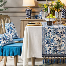 Load image into Gallery viewer, Porcelain Blue Table Runner by Allthingscurated features detailed designs of florals and birds in blue and printed on white background, inspired by the ancient Chinese Porcelain. A fusion of the east and west— this CHINOISERIE style is contemporary, CHARMING and TIMELESS. We added generous tassels in two shades of blues for a striking contrast. Made of cotton-linen blend with 6 sizes available.