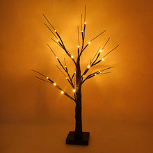 Load image into Gallery viewer, Black LED Birch Tree Light by Allthingscurated is the perfect home decor display for your beloved Halloween celebration. Measuring 60cm or 23.4 inches in height, it comes in either 24 LED Warm White Light or 36 LED Orange Light. The twigs are bendable and adjustable to achieve an optimal effect. Shown here is the black tree with 24 LED Warm White light.