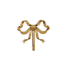 Load image into Gallery viewer, These pretty wall hooks by Allthingscurated are made of high-quality brass with a vintage gold finish.  Fashioned like a bow tied with ribbon, it’s feminine and perfect for the walk-in wardrobe or powder room. Comes in small and large size. Small hook measures 7.3cm or 2.8 inches in height and 6.5cm or 2.5 inches in width. Large hook measures 10.3cm or 4 inches in height and 9.5cm or 3.7 inches in width. Sold as individual hooks or a set of small and large hooks. This is  a small hook.