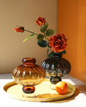 Load image into Gallery viewer, Luna Lantern Vases by Allthingscurated are stylish and versatile. Crafted from high-quality thick glass and creatively shaped like an Oriental Lantern with a strong aesthetic, they are perfect for creative floral arrangement or simply as a decorative display on its own. Comes in 2 sizes and 3 avaliable colors of green, gray and amber.