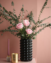 Load image into Gallery viewer, Zayla Bubble Vase by Allthingscurated features a geometric bubble design. The eye-catching detail and design are enough to make it a statement centerpiece with or without floral display. Comes in black or clear and in 2 sizes. The short vase measures 17cm or 6.6 inches in height and 16cm or 6.2 inches in diameter. The tall vase measures 27.5cm or 10.7 inches in height and 13cm or 5 inches in diameter. This is a tall black vase with pink roses and eucalyptus.