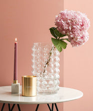 Load image into Gallery viewer, Zayla Bubble Vase by Allthingscurated features a geometric bubble design. The eye-catching detail and design are enough to make it a statement centerpiece with or without floral display. Comes in black or clear and in 2 sizes. The short vase measures 17cm or 6.6 inches in height and 16cm or 6.2 inches in diameter. The tall vase measures 27.5cm or 10.7 inches in height and 13cm or 5 inches in diameter. This is a tall clear vase with a sprig of pink hydrangea.