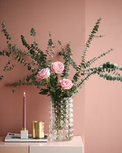 Load image into Gallery viewer, Zayla Bubble Vase by Allthingscurated features a geometric bubble design. The eye-catching detail and design are enough to make it a statement centerpiece with or without floral display. Comes in black or clear and in 2 sizes. The short vase measures 17cm or 6.6 inches in height and 16cm or 6.2 inches in diameter. The tall vase measures 27.5cm or 10.7 inches in height and 13cm or 5 inches in diameter. This is a tall clear vase with pink roses and eucalyptus.