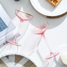 Load image into Gallery viewer, Allthingscurated Alaia Pink gold-rimmed champagne Coupe with a capacity of 140ml or 4.7 fluid ounce. Made of lead-free crystal glass