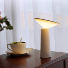 Load image into Gallery viewer, Cordless and portable bar table lamp in minimalist design, available in Black or White. Dimmable with 3 lighting modes from warm, to white and natural light. Fully charged in 4 hours with USB cable.