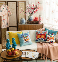 Load image into Gallery viewer, Allthingscurated Oriental Joy Modern Cushion collection comprising 45x45cm cushion covers in 2 designs available in blue pink, red, orange and green; and a 40x35cm cushion in the shape of oriental lion available in orange, green, pink and red.